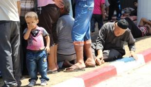 Familles déplacées par les bombardements et réfugiées dans l'enceinte de l'hôpital Shifa